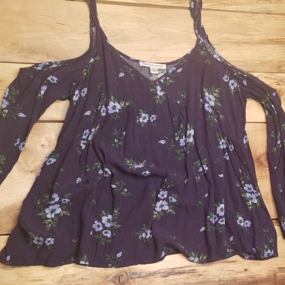 Peek-a-boo shoulder top.